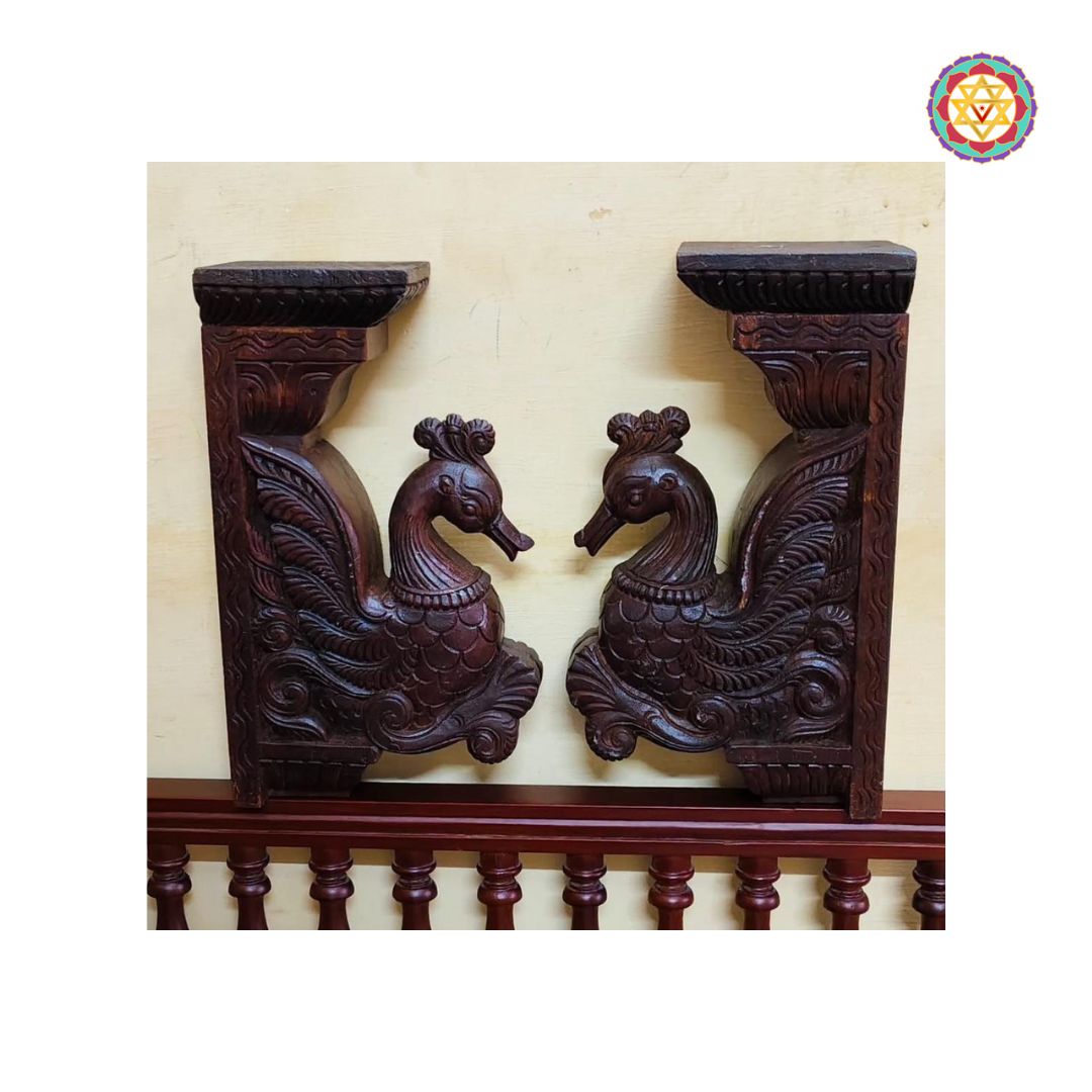 Side view of wooden swan wall bracket showing detailed carving