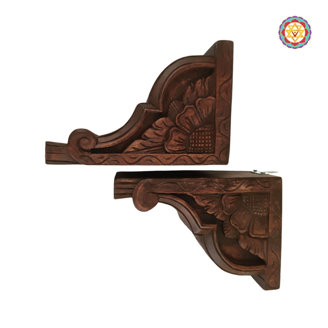“Handcarved wooden wall bracket with floral carvings”