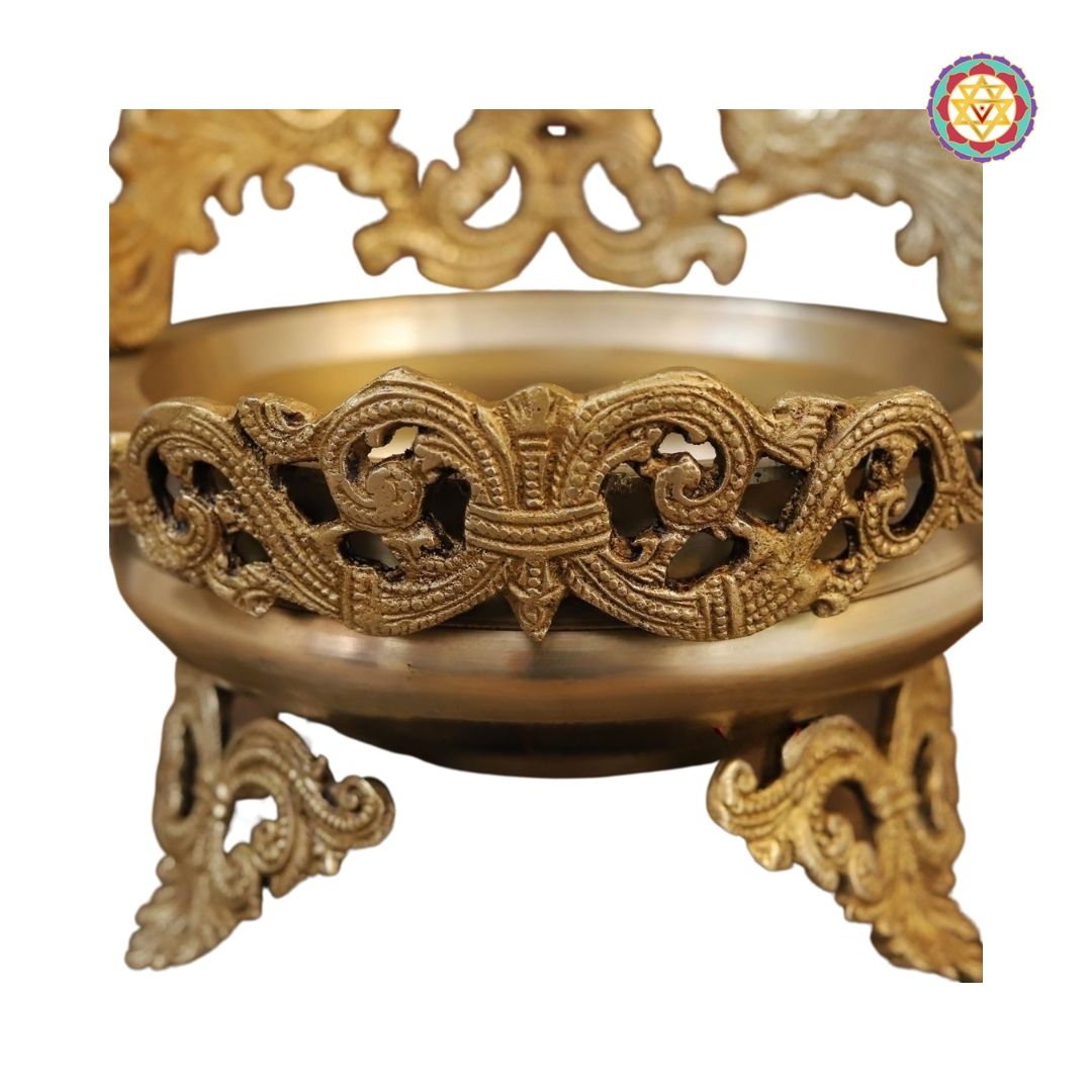 side view of Ganesh urli showing decorative floral rim