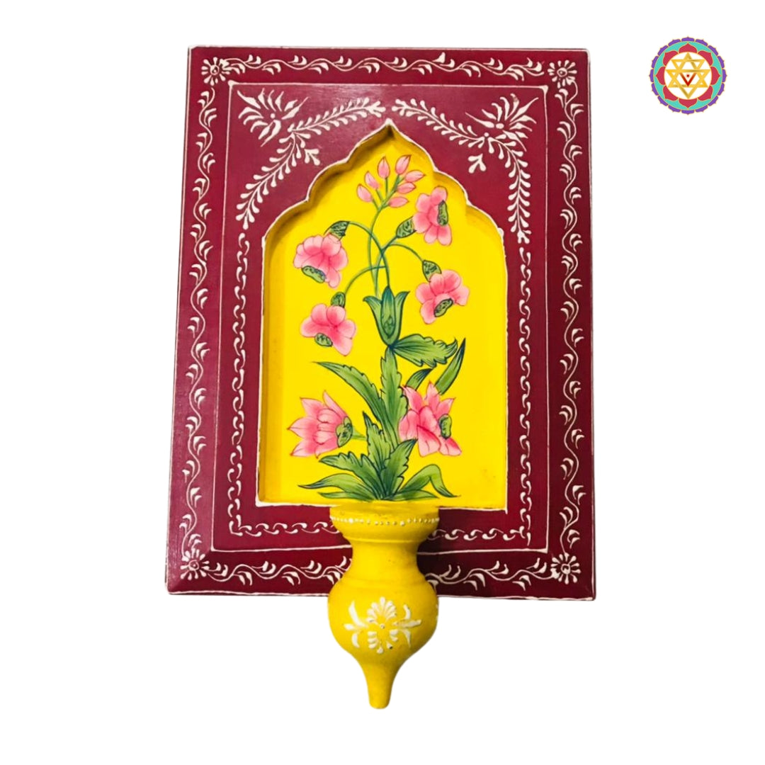 Red and yellow handcrafted wall décor with floral pattern
