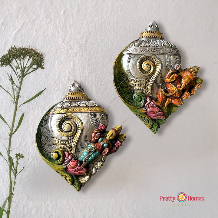 woodcarved conch/shankh wall frames with Ganesha and Laxmi on lotus -set of 2