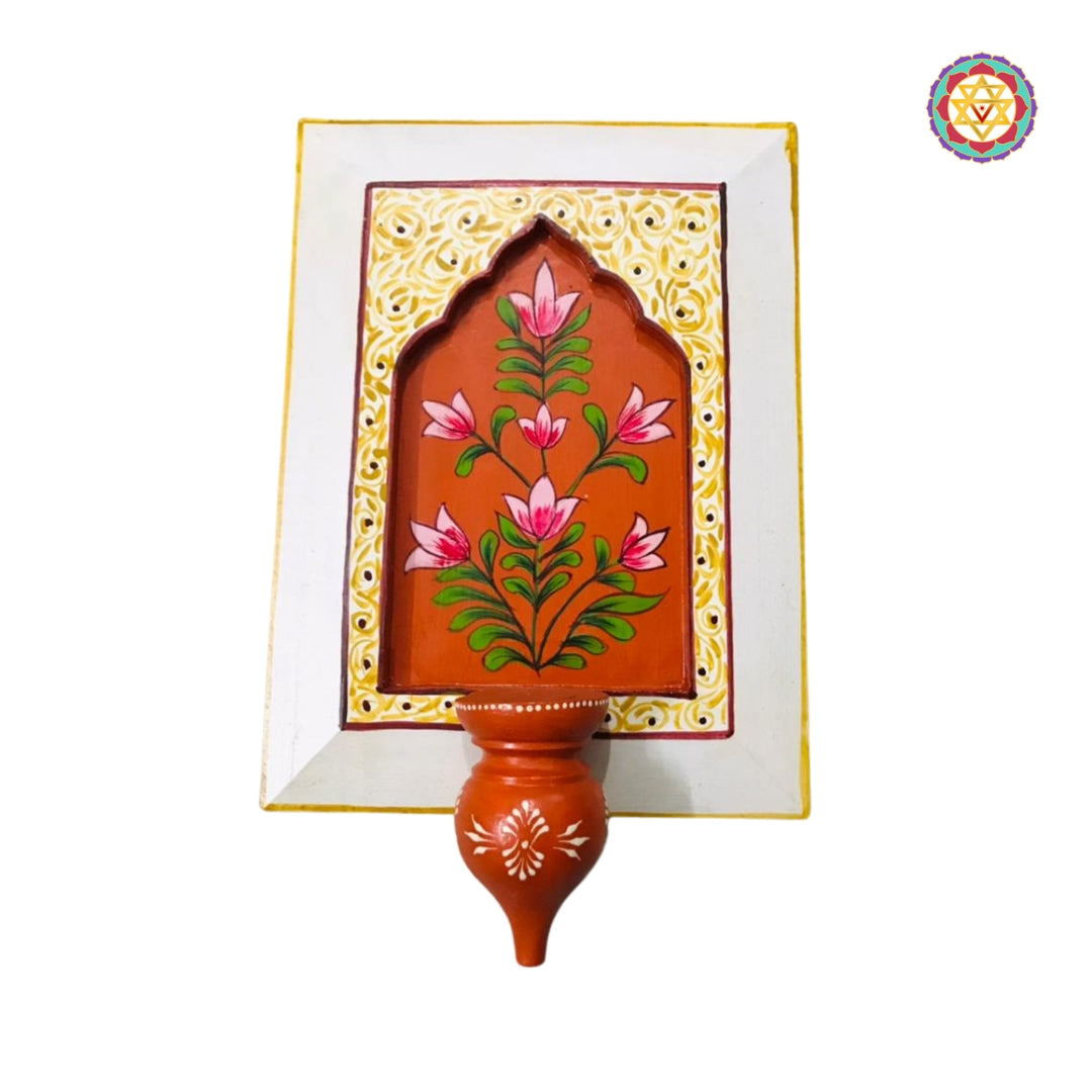 Orange hand-painted wall frame with traditional Indian motifs