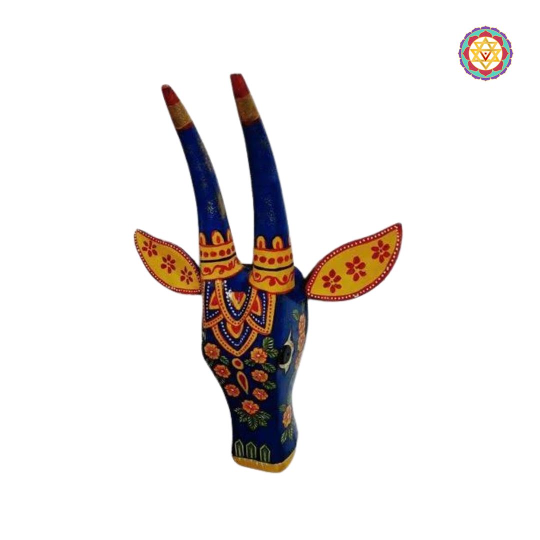 angled view of blue floral cow head wall mount showcasing intricate detailing and vivid colors