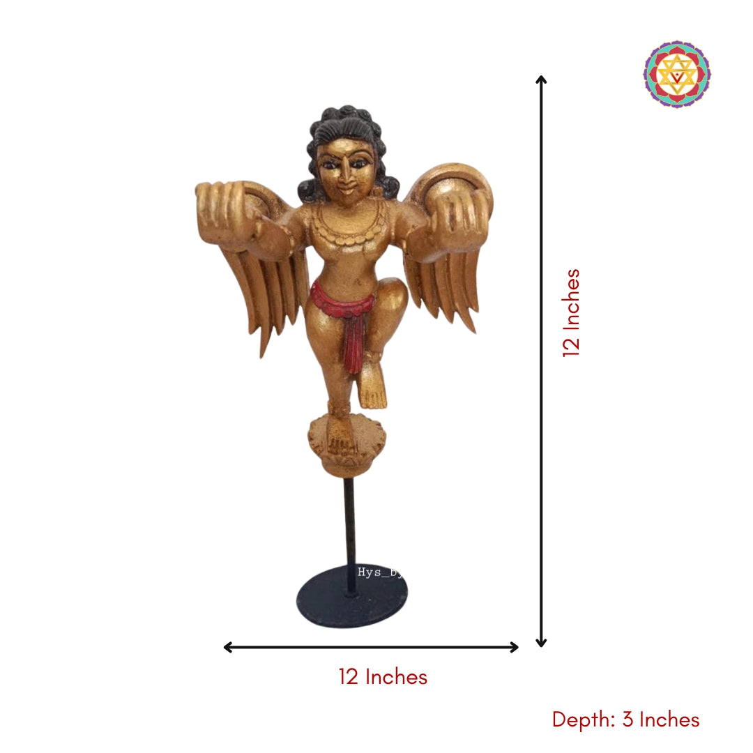 Side view of Gandharva Indian angel wooden statue — finely carved wings and ornaments, artisan finish for traditional decor