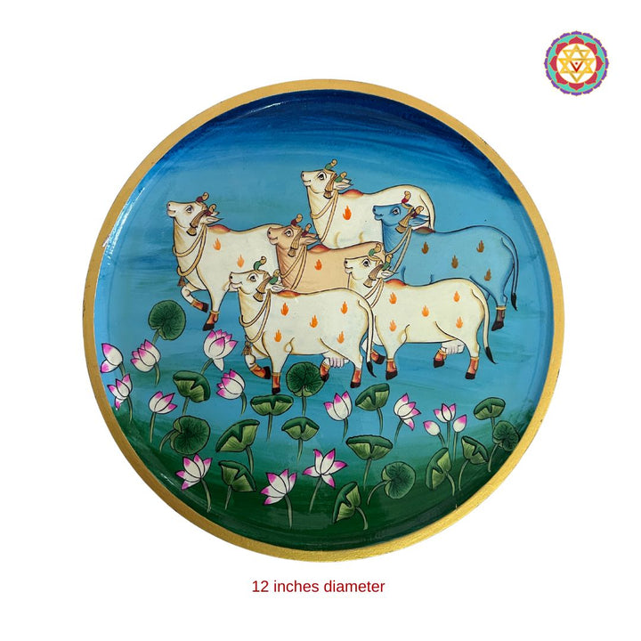 close-up of Pichwai cows highlighting lotus detailing and brushwork