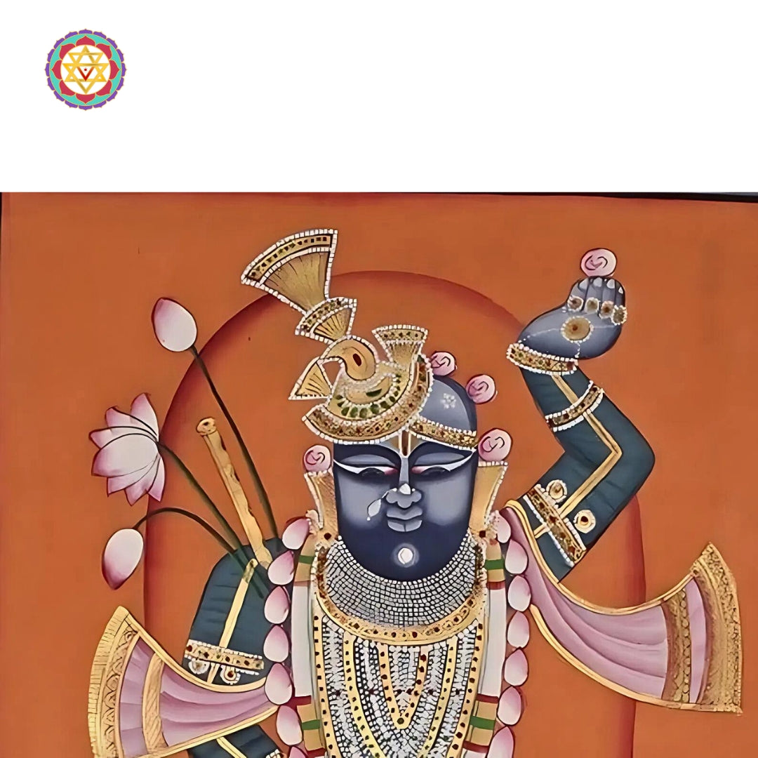 Handwoven Pichwai fabric displaying elaborate floral and animal motifs used as temple backdrops