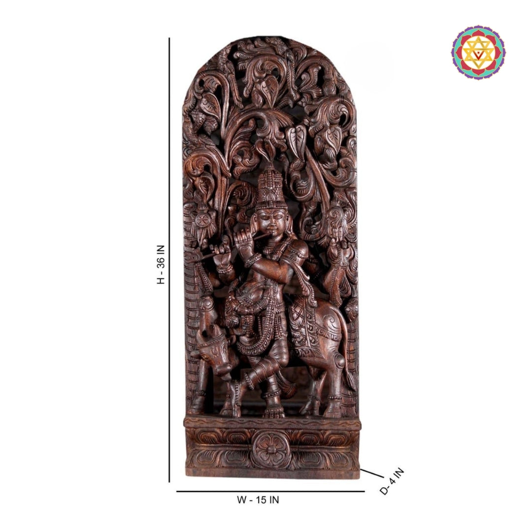Full view of handcrafted Krishna statue showing sacred cow, flute pose, and artistic carvings