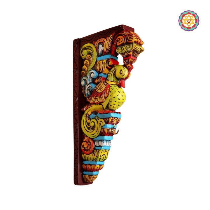 Traditional carved wooden wall bracket with parrot motif