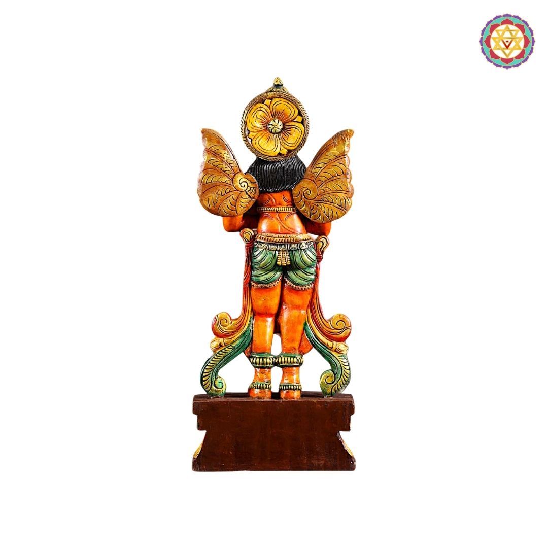 Side-angle view of carved Garuda statue detailing