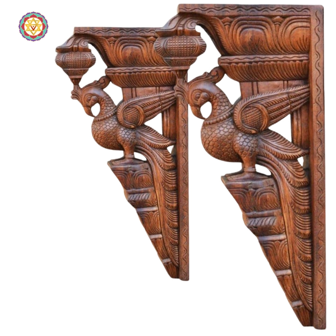 Side profile of wooden parrot wall bracket showing intricate bird carvings and antique finish