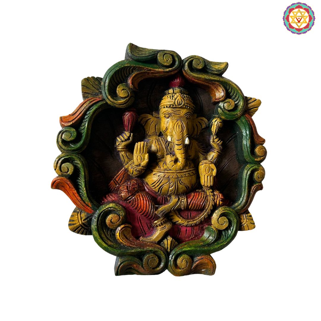 Colourful woodcarved ganesh wall frame with vines.