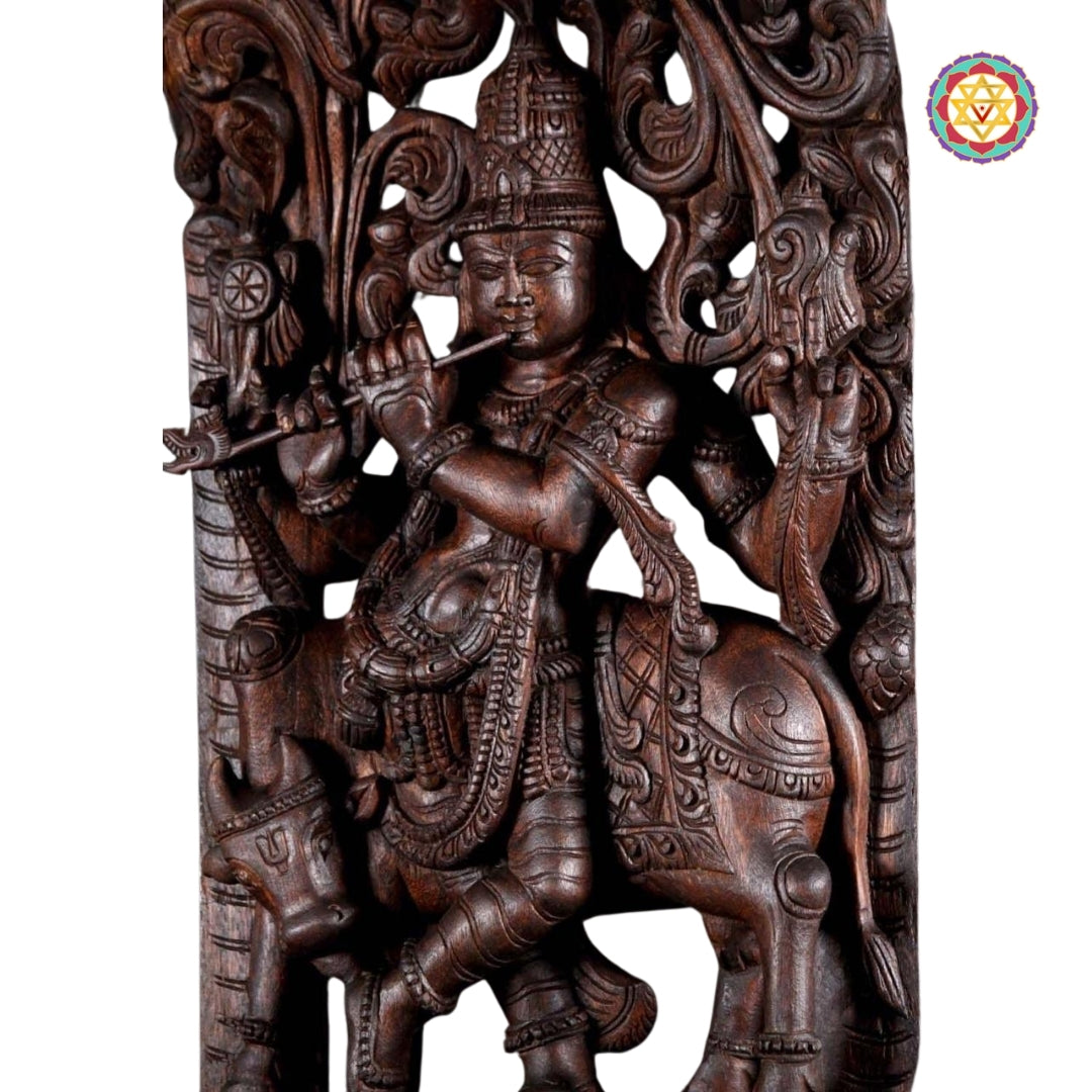 Detailed view of Krishna and cow wood sculpture showing fine craftsmanship and floral backdrop