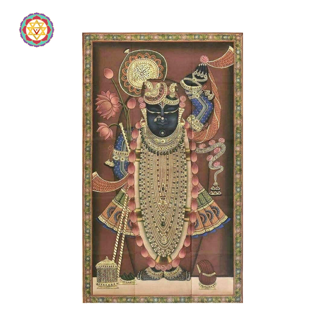 Detailed floral Pichwai painting with lotuses and decorative patterns symbolizing divine grace