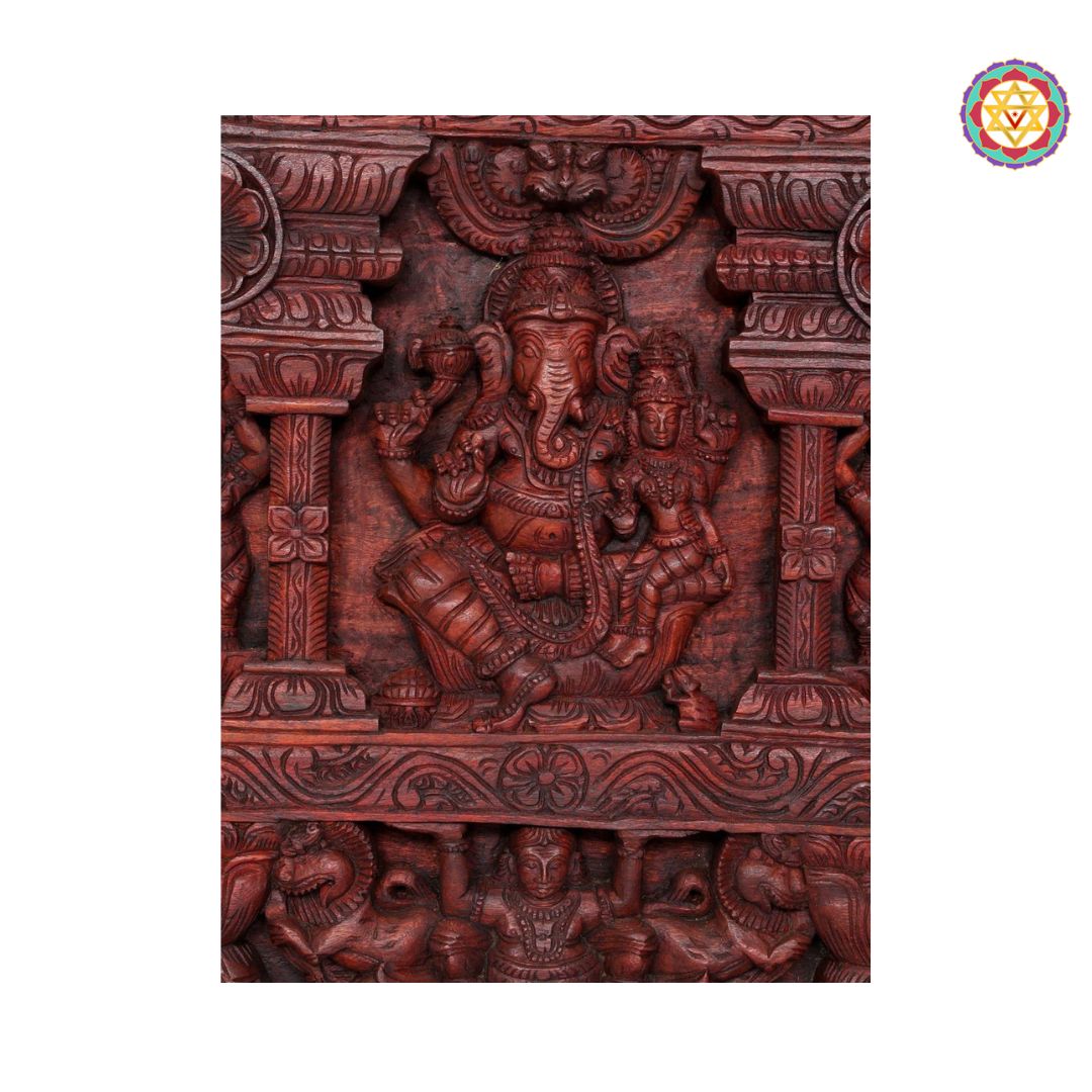Angled view showing multicolour finish and detailed carvings