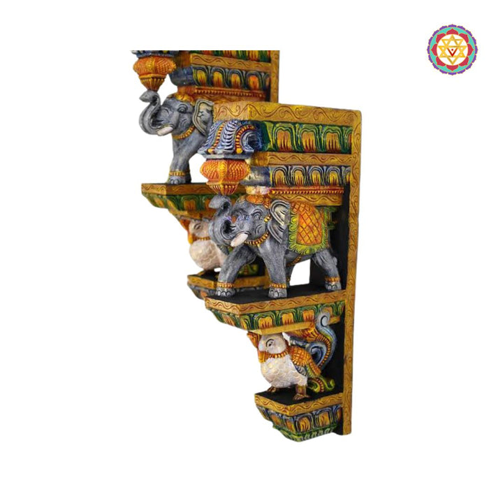 “Handcarved multicolour wooden wall bracket with trunk up elephant and peacock”