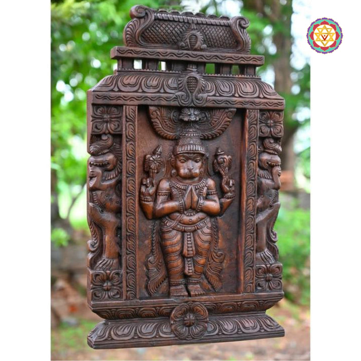 Hand-carved vertical wooden wall panel in Chettinad gopuram style
