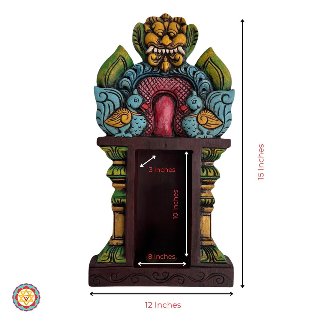 Annam carved temple shelf — ornate wood wall-mounted decor.