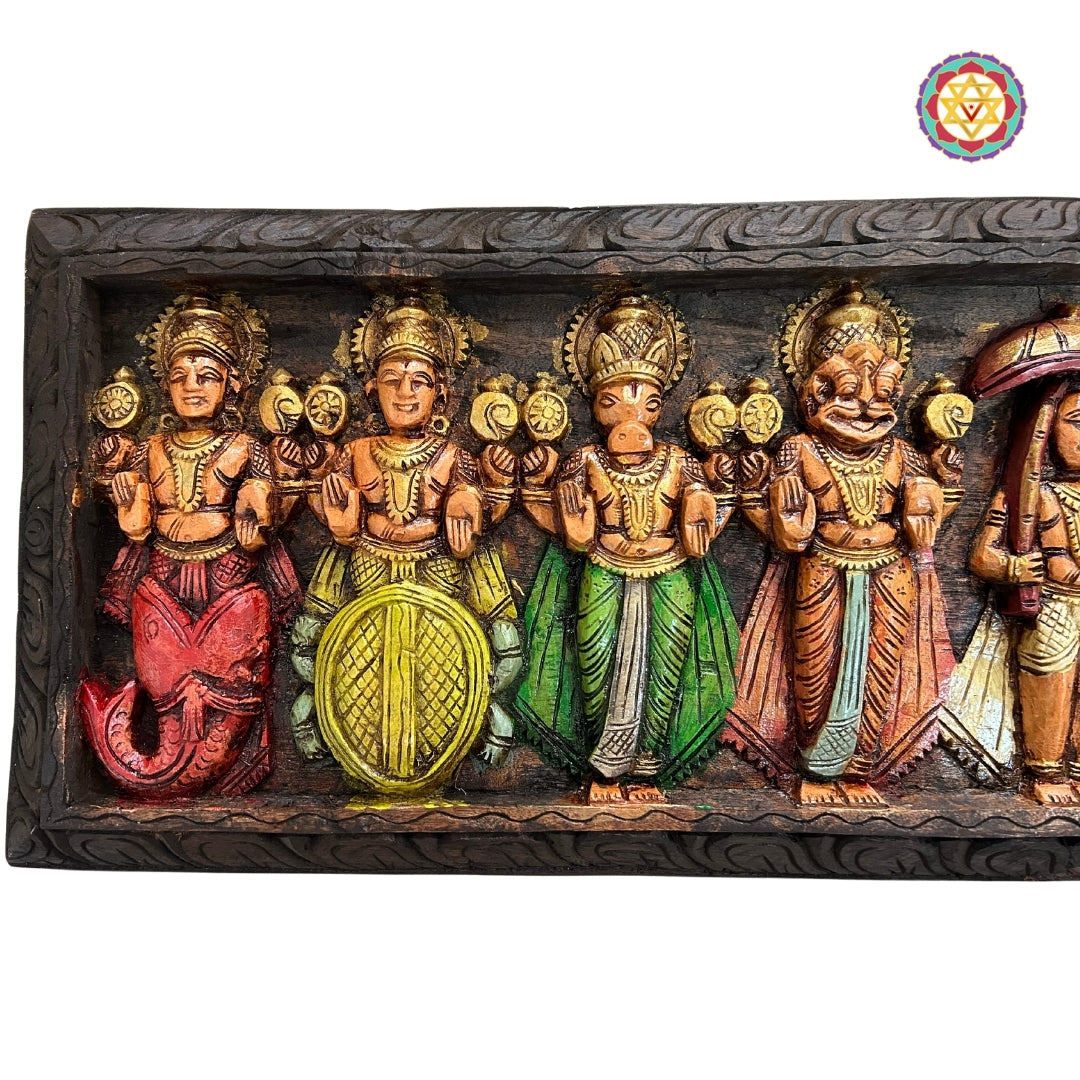 Close-up of Vishnu avatars carved on wood with multicolour finish