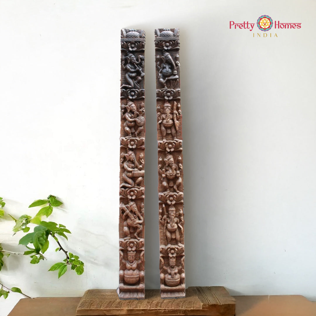 Decorative wooden panels with carvings on a white background, branded 'Pretty Homes India'. Vertical wooden wall panel pair with musical Ganesha carving.