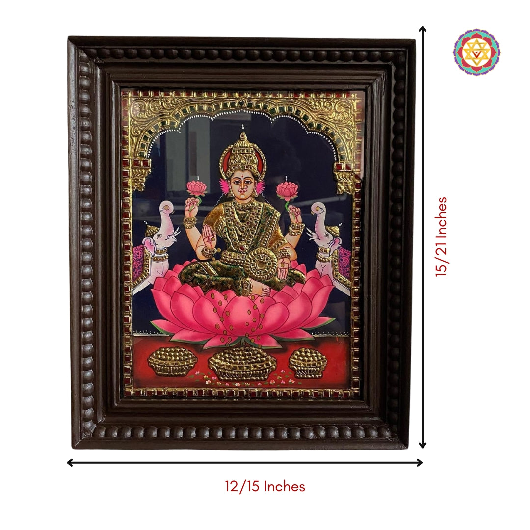 “Gajalakshmi painting in carved teakwood frame, ideal for pooja decor or festive gifting”