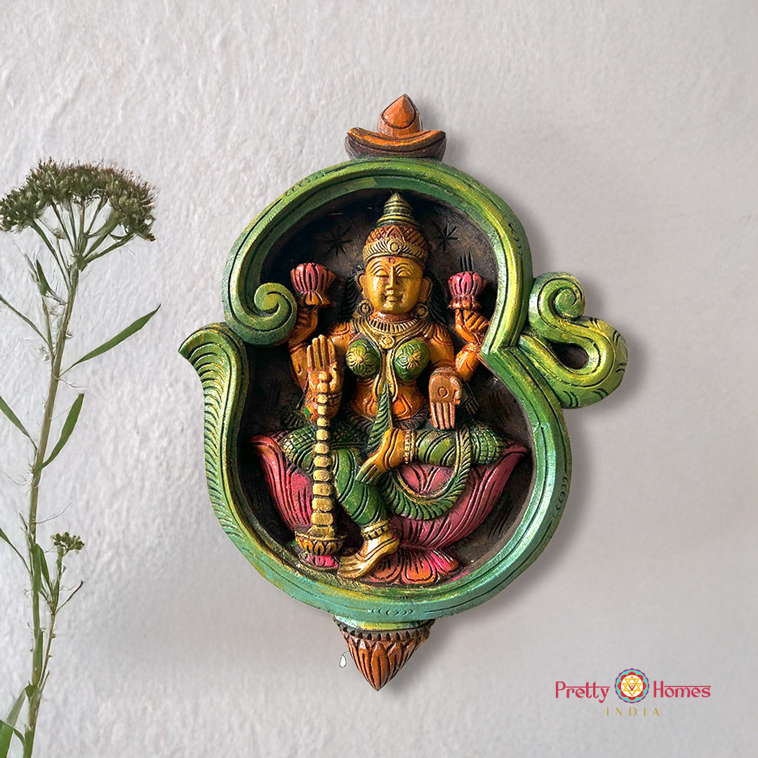 om shaped dhanlaxmi carved wooden frame multicolour finish