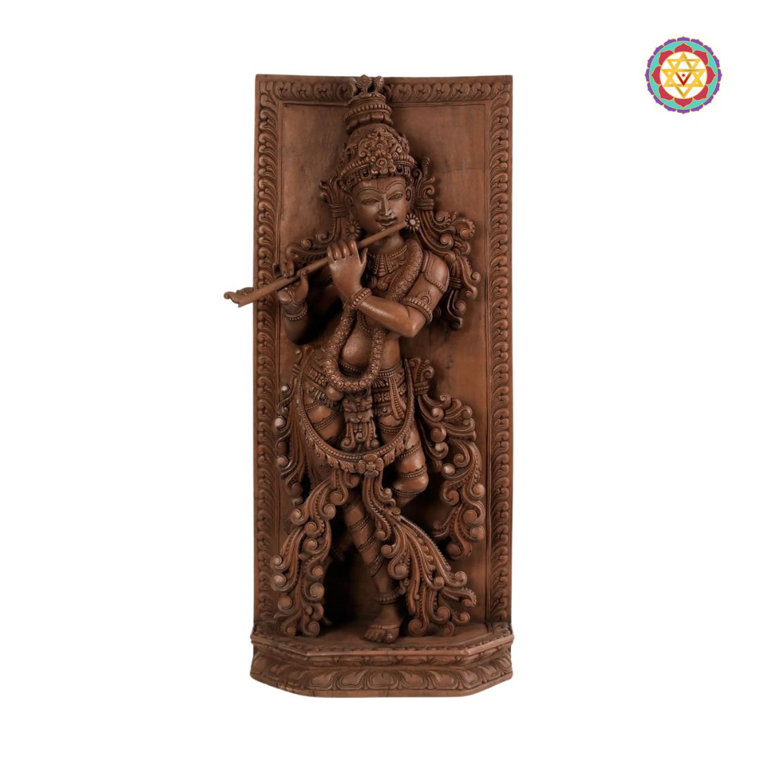 Decorative wall art of a figure playing a flute on a white background - Close-up of Krishna’s face and flute detail