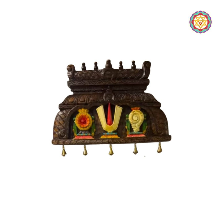 Carved wooden wall panel with Shankh Chakra Namam in temple gopuram design

