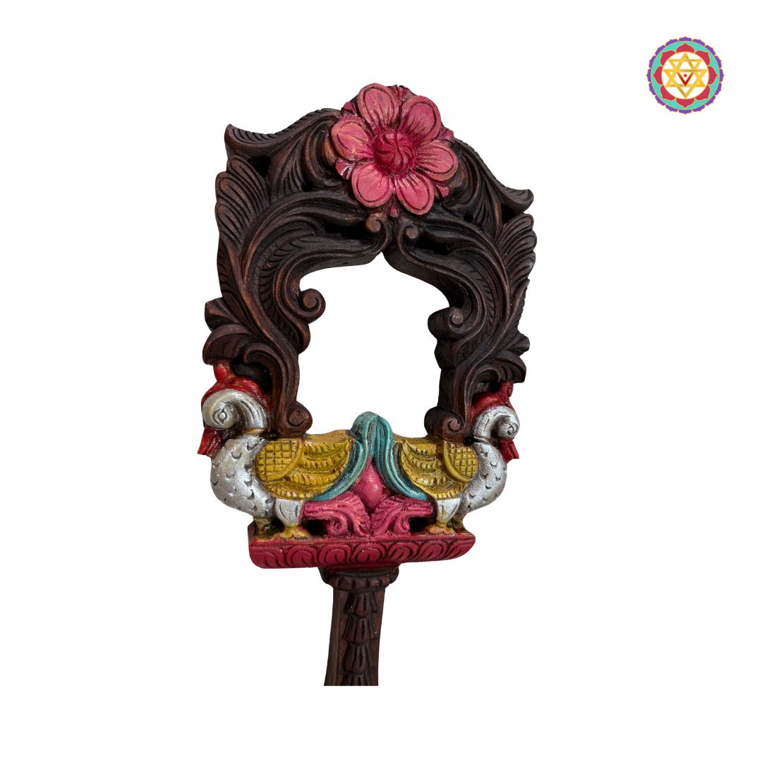 Side-angle view showing detailing of annam motifs on mirror frame