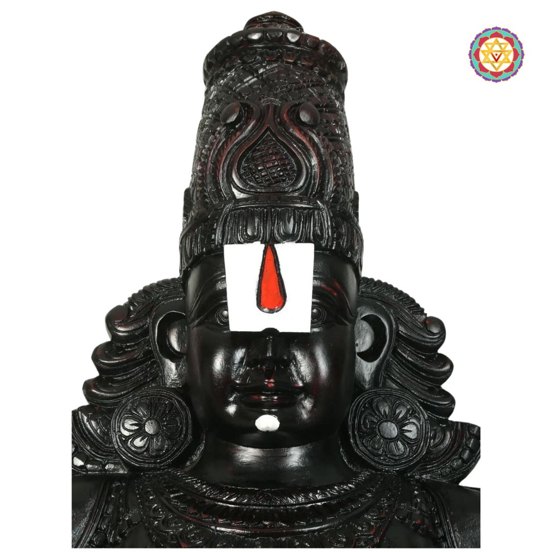 teakwood perumal statue displayed in home mandir setup