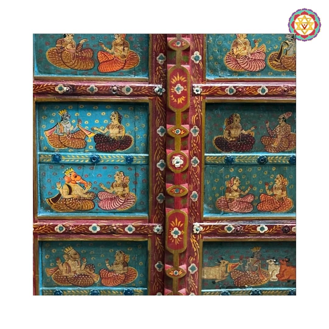 Closeup of painted motifs on Pichwai wooden door frame