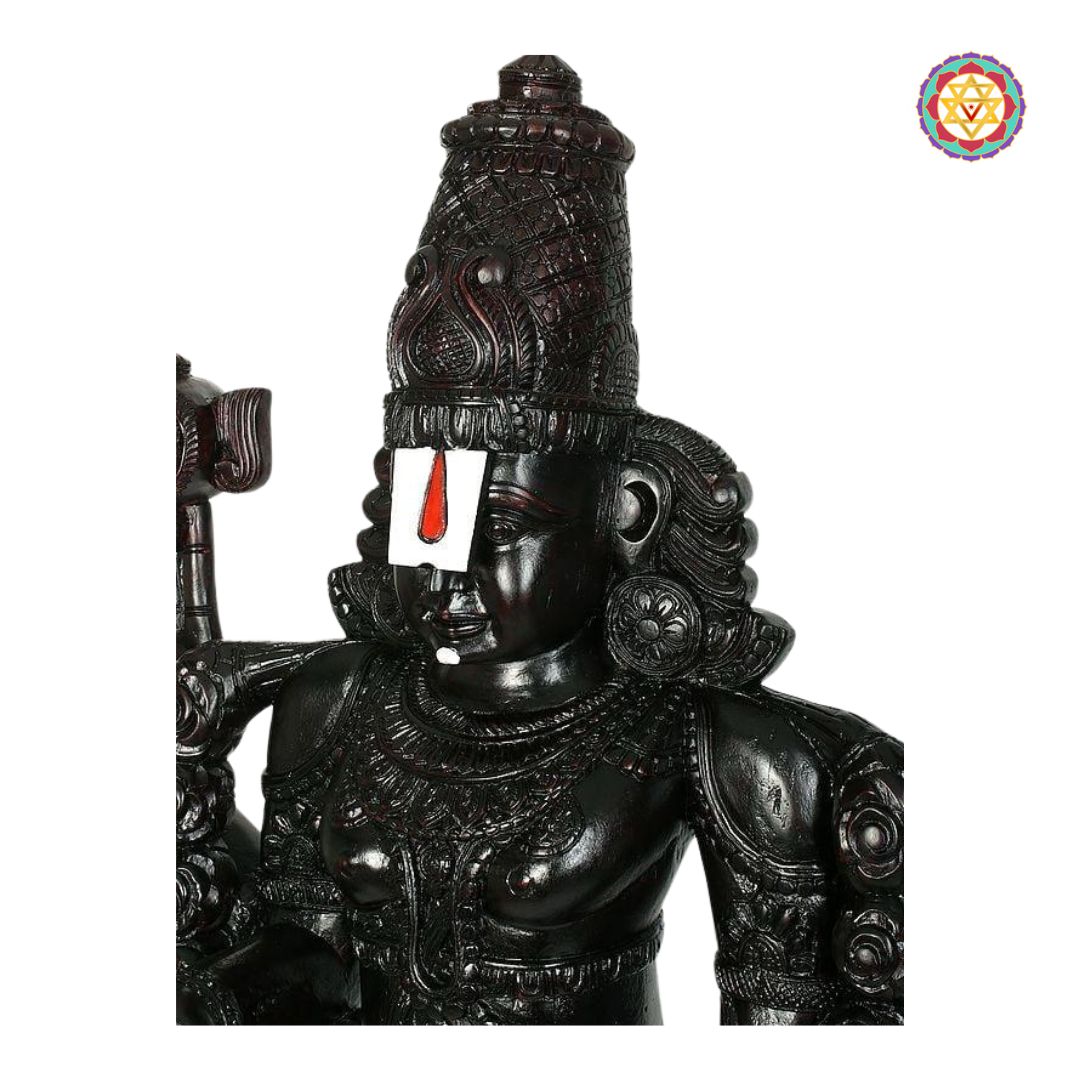 detailed carving on lord balaji wooden statue with traditional iconography