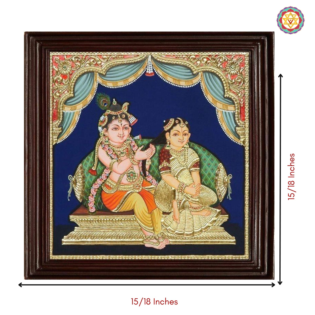 Antique Tanjore painting of Radha Krishna with vibrant color palette and divine expression