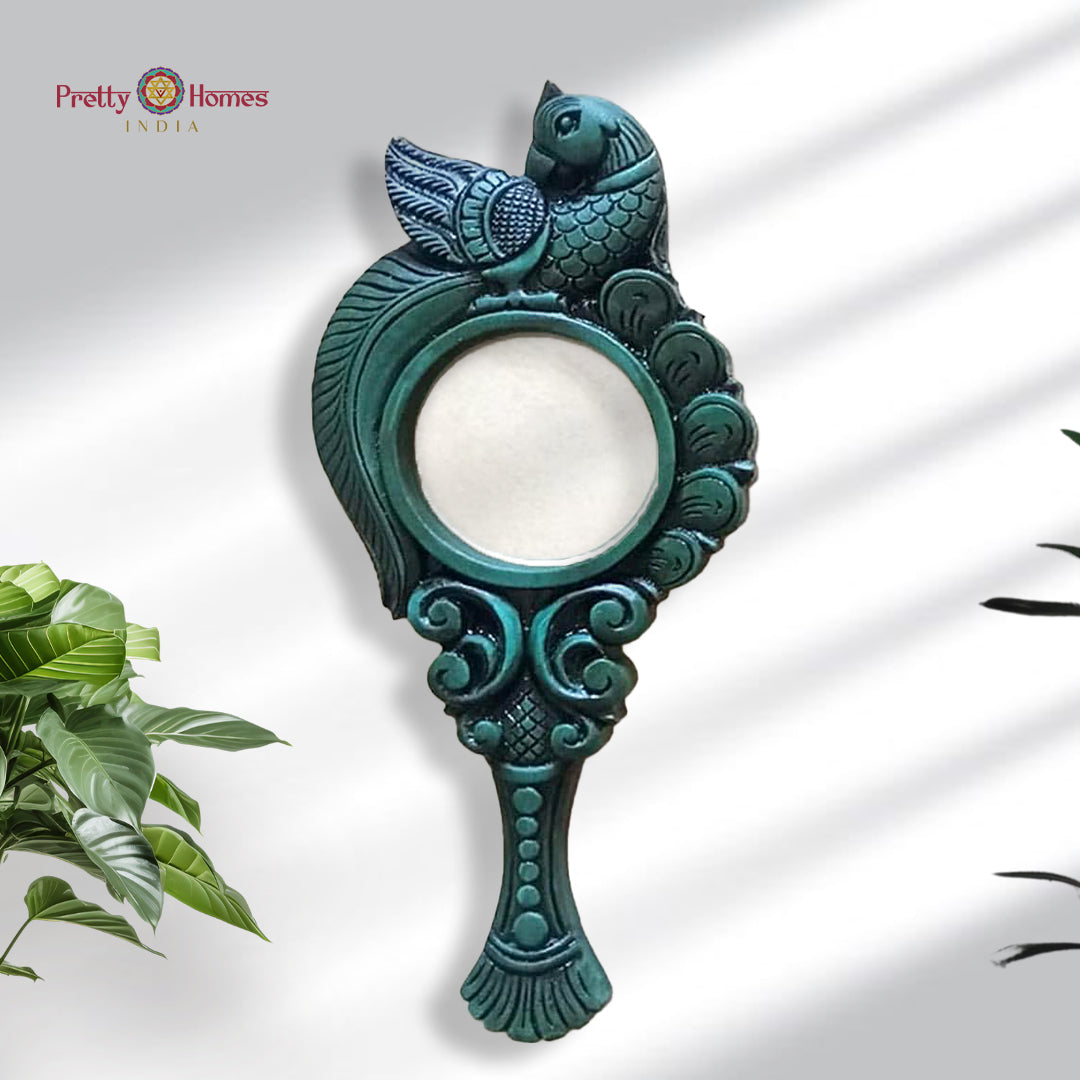 Wooden mirror frame with parrot design in antique green finish