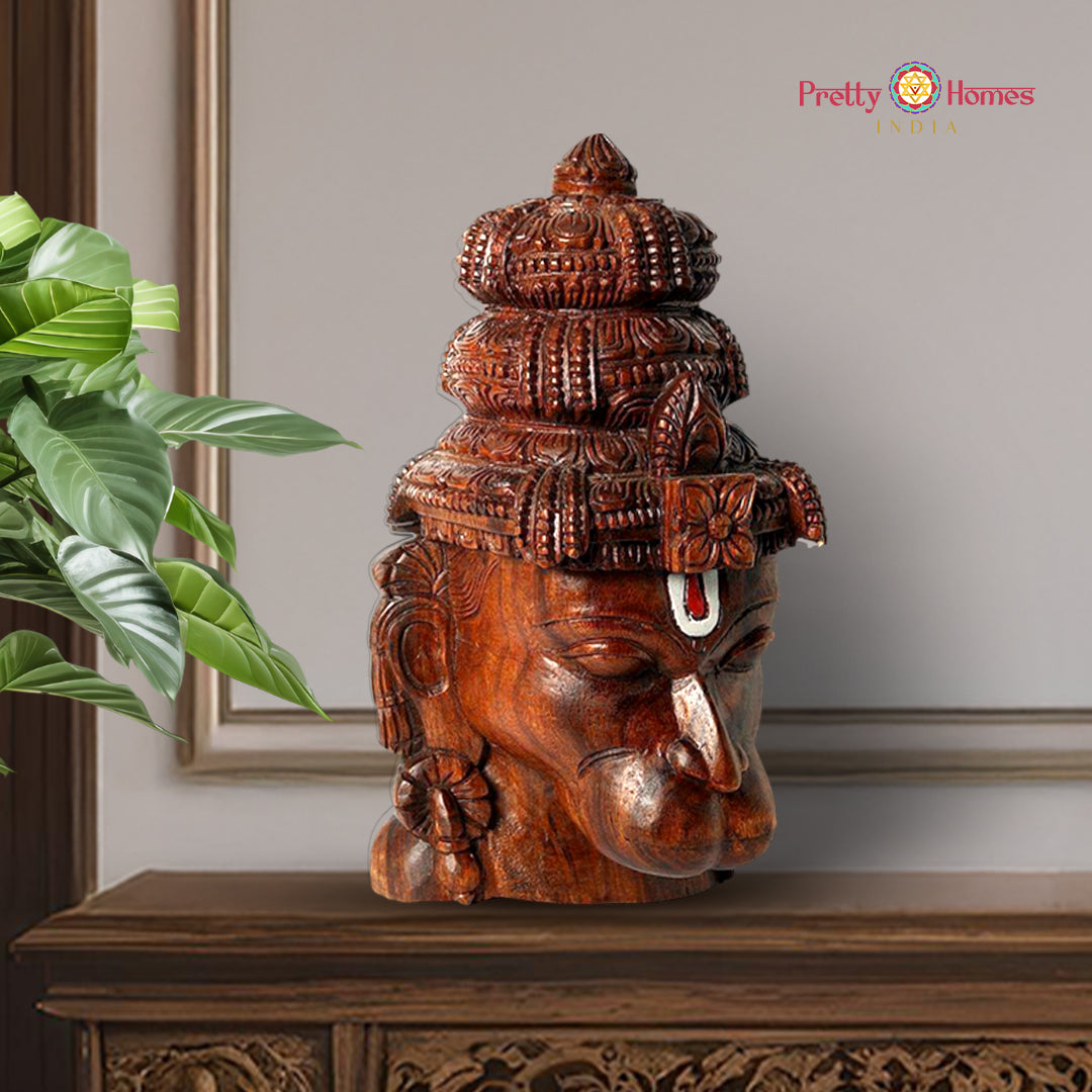 Handcarved wooden Hanuman head sculpture with intricate detailing