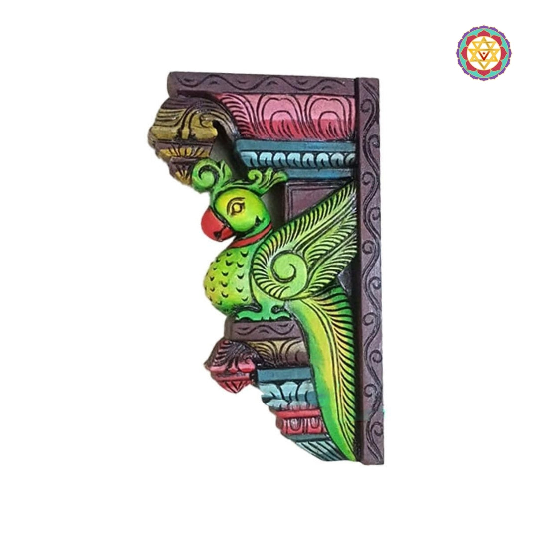 Side view of parrot wall bracket showing traditional South Indian woodwork design