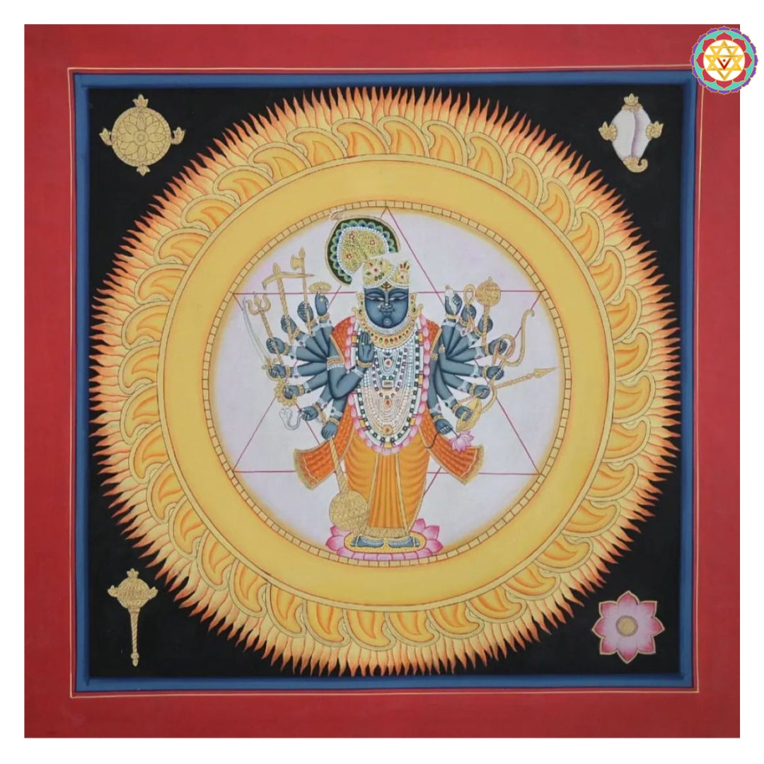 Close-up view of Sudarshan Chakra Pichwai painting showing handpainted patterns and vibrant lotus motifs