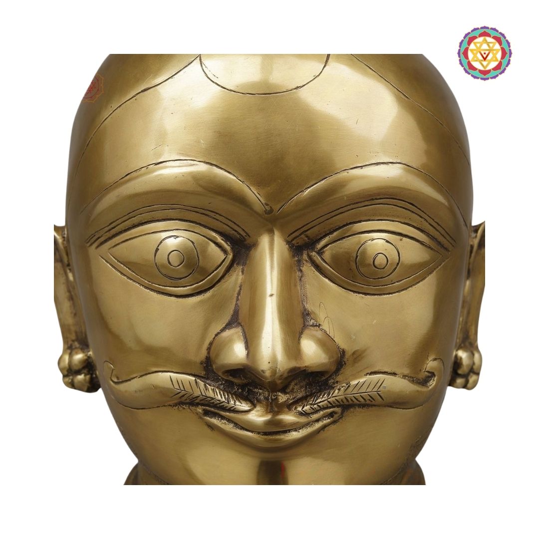 side-angle view highlighting carved facial features and traditional styling