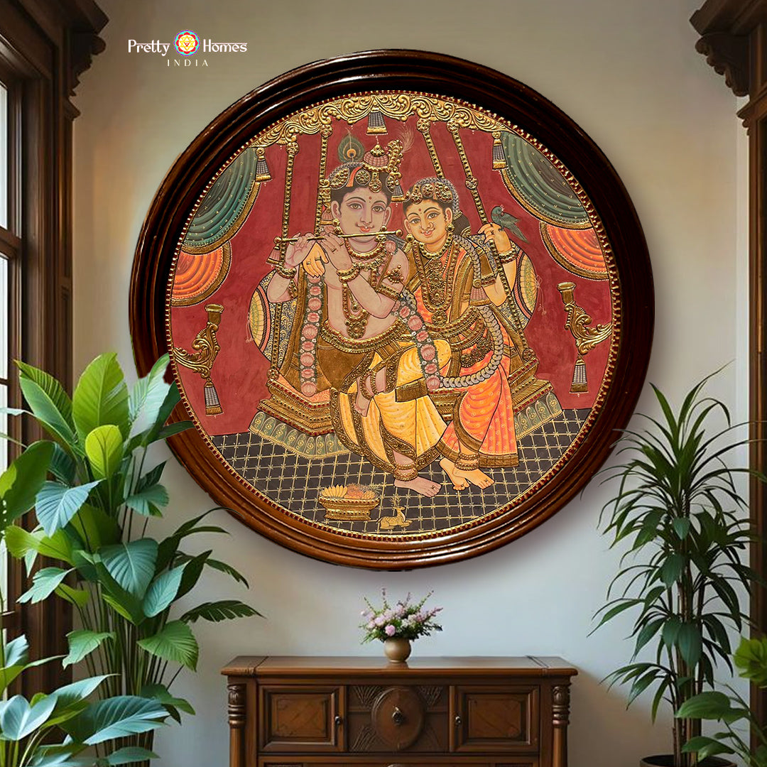 Vintage style Round Handmade Tanjore – Flute Krishna with Radha on Swing | 24K Gold & Teakwood Frame