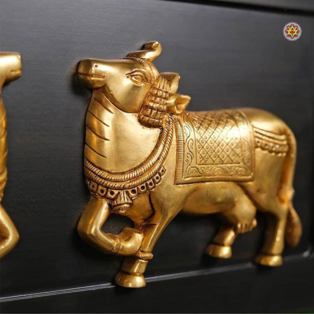 Brass cow and calf wall decor — handmade wooden framed Indian design