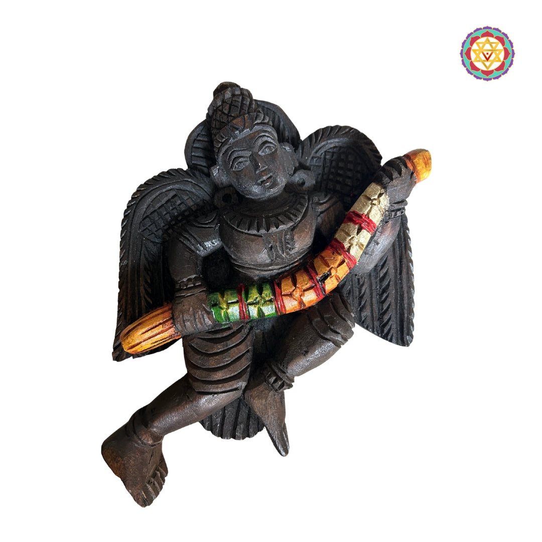 indian mythological angel carvings holding garlands in wood