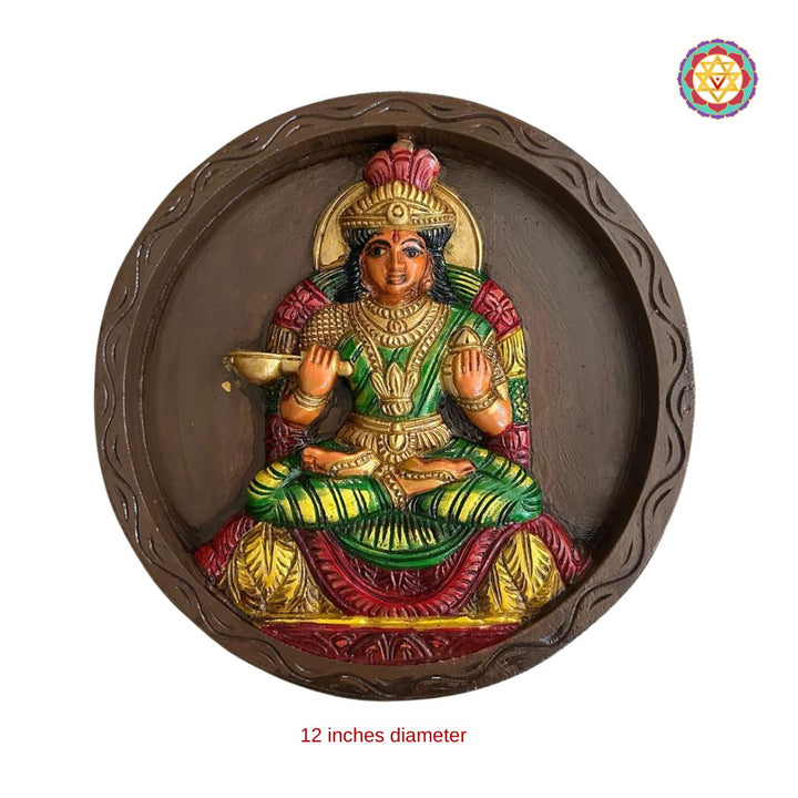 wood carved round Annapurna Devi