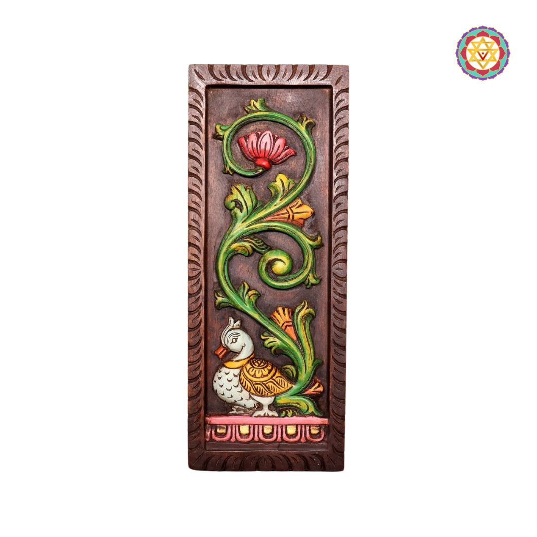 wood carved vertical annapakshi annam with lotus and vines close up of carved lotus and vine motifs