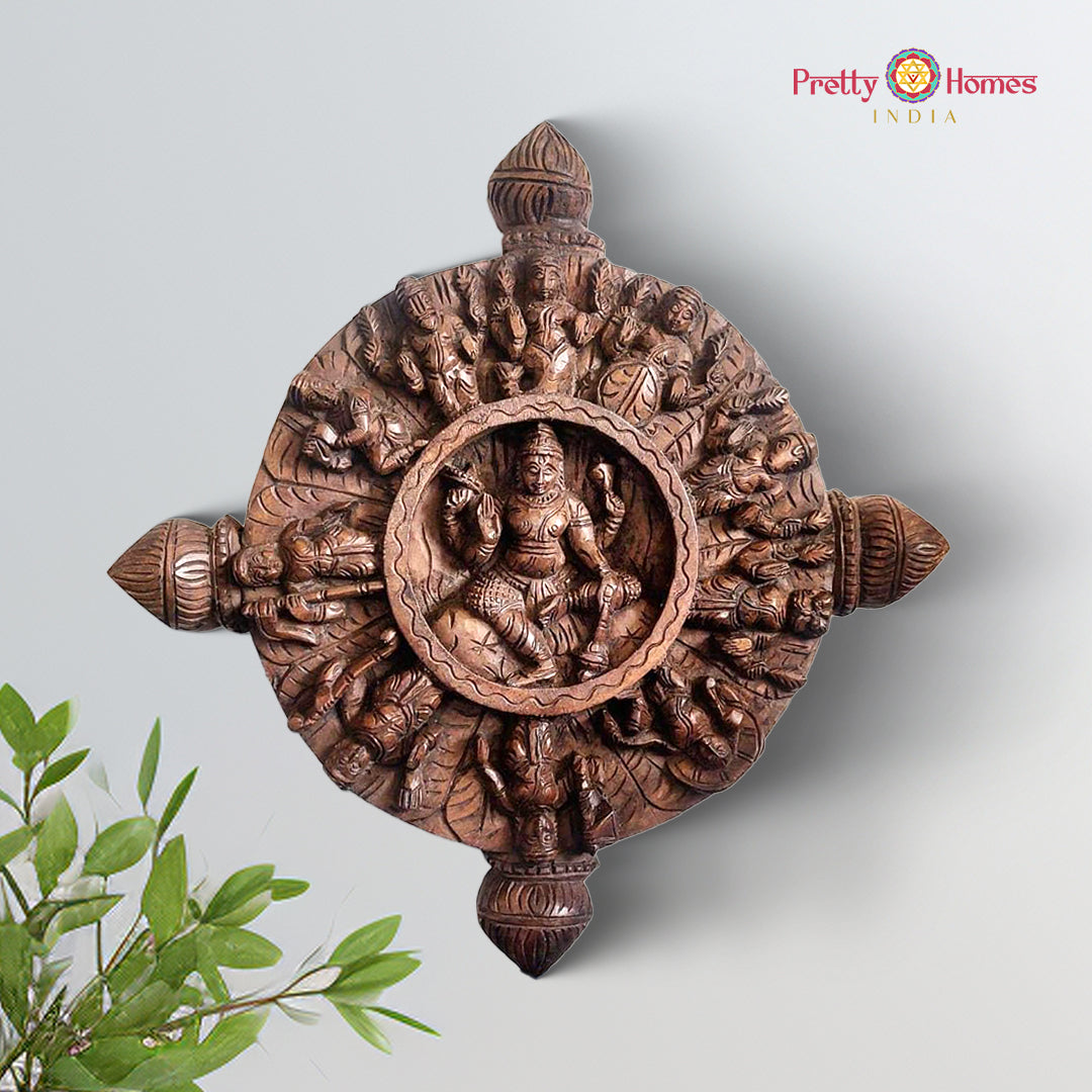 Wooden round wall hanging depicting Ashtalakshmi forms of the goddess