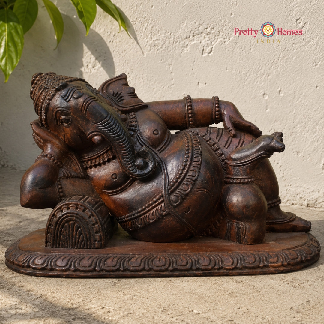 Handcarved Resting Ganesha (Vastu) — Neem Wood, Rosewood Polish