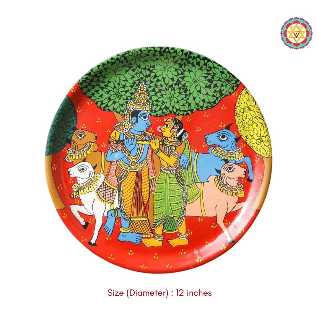 detailed radha krishna artwork in patachitra style on wooden plate