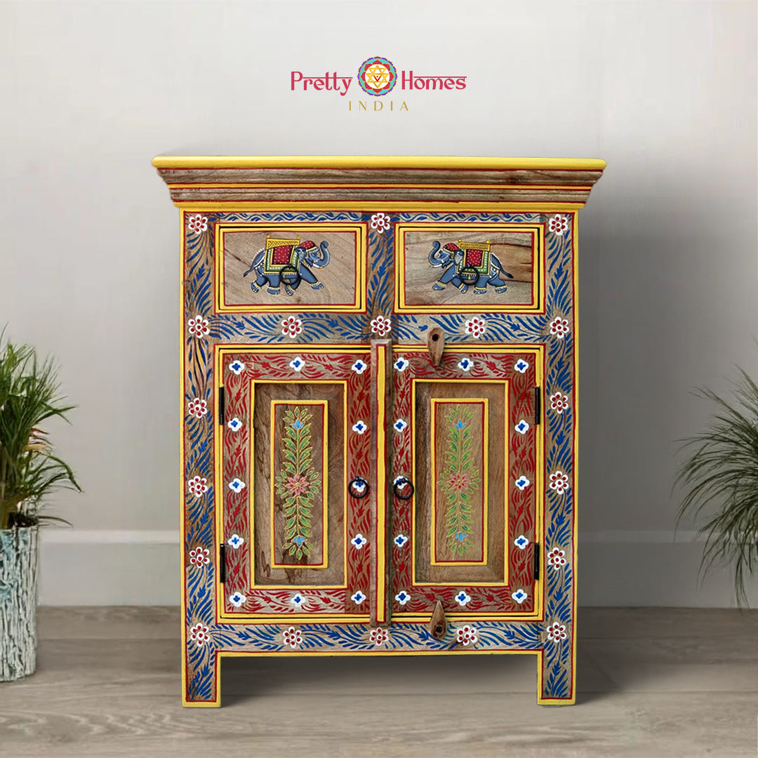 hand-painted wooden cabinet with floral and elephant artwork