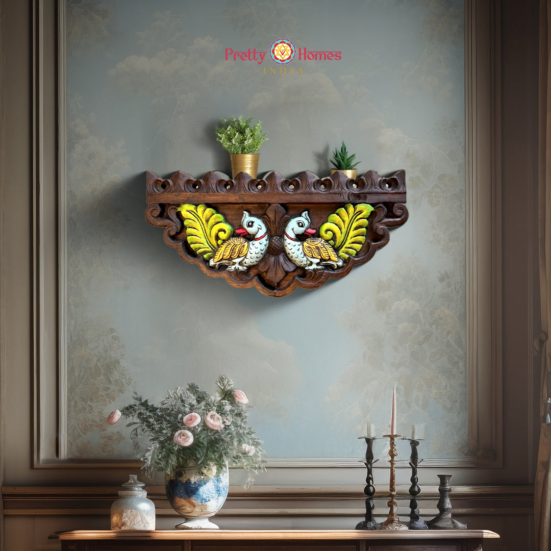 Hand-carved wooden wall shelf with twin annam bird carvings and floral detailing