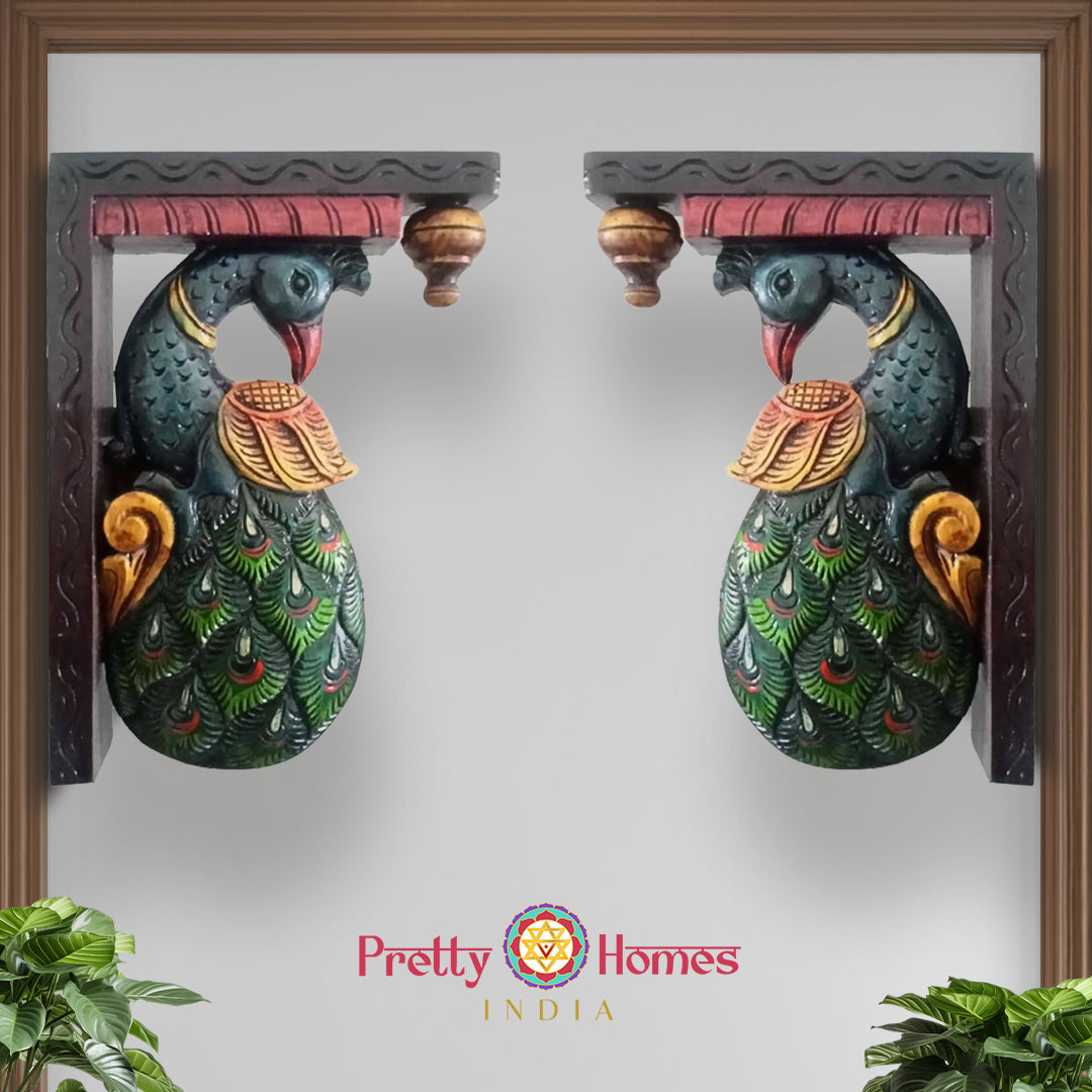 Front view of vintage peacock wall bracket showing handcarved feathers and floral motifs