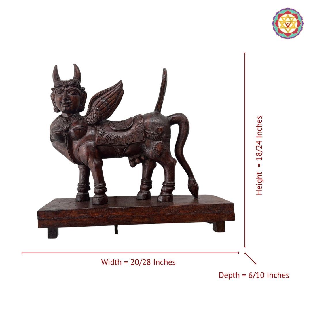 Side angle of wooden Kamdhenu sculpture showing carved ornaments