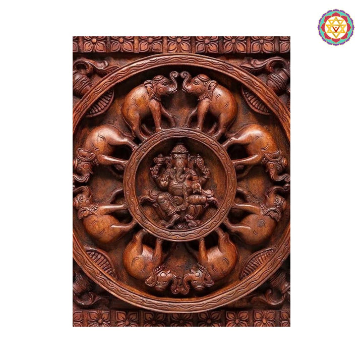 close up of ganesha surrounded by carved elephants circular design